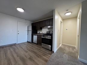 Fall River apartment for rent - A kitchen with a stove top oven and a dishwasher.