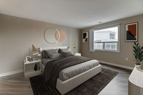 London apartment for rent - a bedroom with a bed and a window in a 555 waverly unit