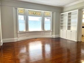Norwalk apartment for rent - a living room with a wooden floor and a large window