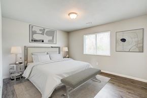 O'fallon apartment for rent - a bedroom with a bed and a window