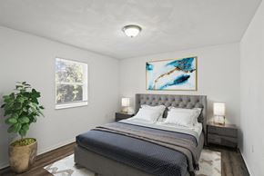 O'fallon apartment for rent - a bedroom with a bed and a window