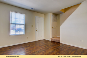 Dupo townhouse for rent - A living room with a wooden floor and white walls.
