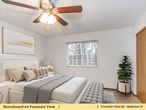 Mascoutah apartment for rent - a bedroom with a bed and a ceiling fan