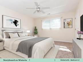 Swansea apartment for rent - a bedroom with a bed and a ceiling fan