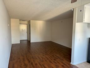 Mar Vista apartment for rent - A room with wooden floors and white walls.