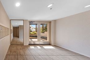 Los Angeles apartment for rent - a hallway with doors and a tiled floor
