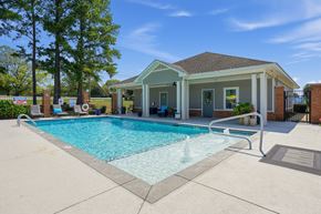 Millbrook apartment for rent - A pool in front of a house.