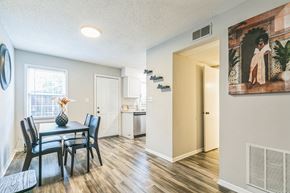 Spartanburg apartment for rent - A dining room with a table and chairs.
