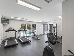 Montgomery apartment for rent - A gym with treadmills, exercise bikes, and other equipment.
