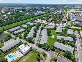 Carol Stream apartment for rent - Aerial view of the Renaissance at Carol Stream apartment community featuring a swimming pool, located in Carol Stream, IL.