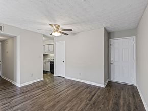 Montgomery apartment for rent - Room with wood floors and ceiling fan at Stratford Village Montgomery AL