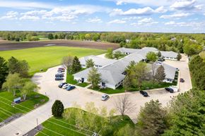 Springfield apartment for rent - an aerial view of a farm house and parking lot