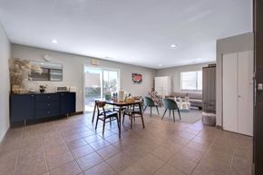 Holland apartment for rent - A dining room with a table set for four.