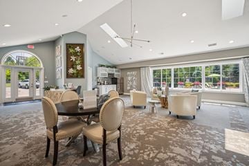 Fenton apartment for rent - A dining room with a table and chairs.