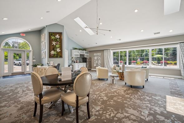 Fenton apartment for rent - A dining room with a table and chairs.