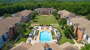 Carrollton apartment for rent - Aerial view of The Foundry with central pool in Carrollton GA