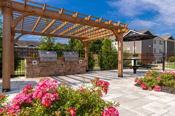 Shaded pergola seating area - the foundry carrollton - professionally operated by highlands vista group