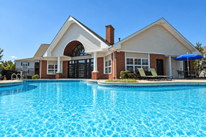Louisville apartment for rent - A house with a pool in front.