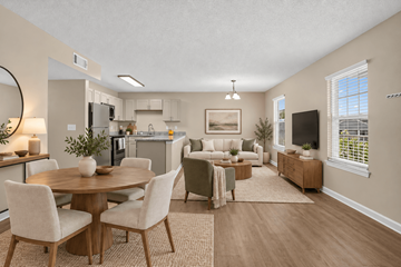 Millbrook apartment for rent - A well-lit, spacious kitchen and living room with a dining table and chairs.