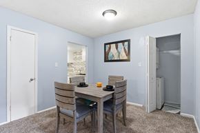 Tallahassee apartment for rent - A dining room with a table and chairs.