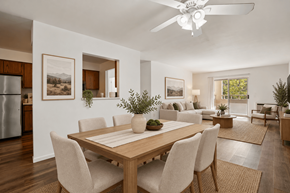 Madison apartment for rent - A modern dining room with a wooden table and chairs.