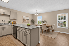 Millbrook apartment for rent - A kitchen with a dining table and chairs.