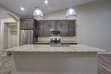 Akron apartment for rent - a kitchen with a counter top and a refrigerator