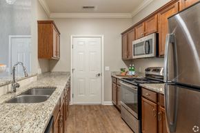 Akron apartment for rent - a kitchen with granite counter tops and stainless steel appliances