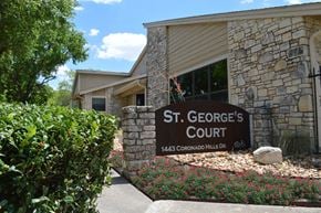 Austin apartment for rent - A sign that says St. George's Court in front of a building.