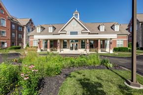 Dublin apartment for rent - Living community clubhouse with landscaped entrance at Avondale Senior Village Apartments, Dublin