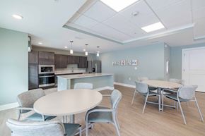 Atlanta apartment for rent - A modern kitchen with a dining table and chairs.