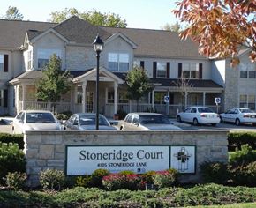 Dublin apartment for rent - A building with a sign that says Stoneridge Court.