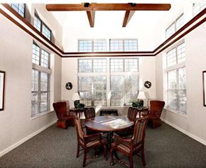 Whitehall apartment for rent - A dining room with a table surrounded by chairs and a ceiling fan.