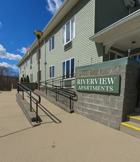 Sistersville apartment for rent - A building with the name Riverview Apartments on it.