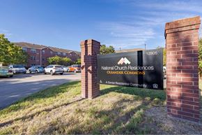 Houston apartment for rent - The sign in front of the brick wall reads "National Cut Residential Commons Oleaner Commons".