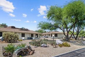 Wickenburg apartment for rent - A row of houses with trees in front.