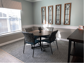 Pembroke apartment for rent - A dining room with a table and chairs.