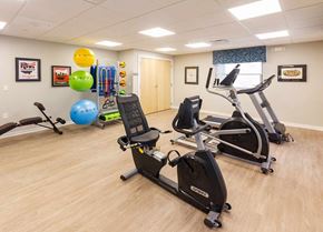 Columbus apartment for rent - A gym room with exercise equipment and a blue exercise ball.