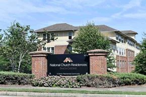 Lithonia apartment for rent - The image shows a sign for National Church Residences Pinehursts in front of a building.