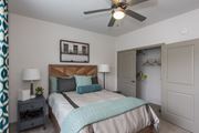 Williamsburg apartment for rent - a bedroom with a bed and a ceiling fan at The Whitworth, Williamsburg, 23185