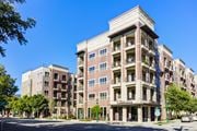Chattanooga apartment for rent - A tall apartment building with a balcony on the second floor.