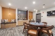 Hixson apartment for rent - A modern dining room with a round table and chairs.