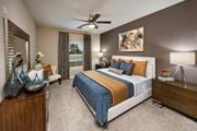 Hixson apartment for rent - a bedroom with a bed and a ceiling fan at Integra Vista Apartments, Hixson, 37343