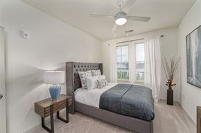 Prospect apartment for rent - a bedroom with a bed and a ceiling fan at Lyric at Norton Commons Apartments, Prospect, 40059