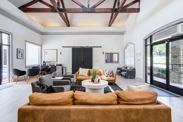 Chattanooga apartment for rent - A living room with a brown couch and a white coffee table.