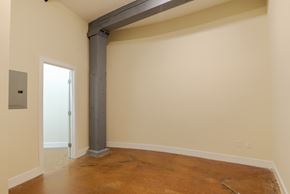 Petersburg apartment for rent - A room with a large pipe on the floor at Mayton Transfer Lofts in VA 23803