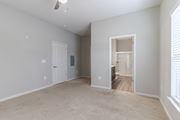 Augusta apartment for rent - A spacious room with a carpeted floor and a ceiling fan.