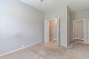 Augusta apartment for rent - A room with a carpeted floor and two open doors.