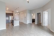 Augusta apartment for rent - A spacious kitchen with a refrigerator, sink, and cabinets.