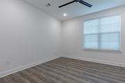 Santa Rosa Beach apartment for rent - A room with a window and a ceiling fan.